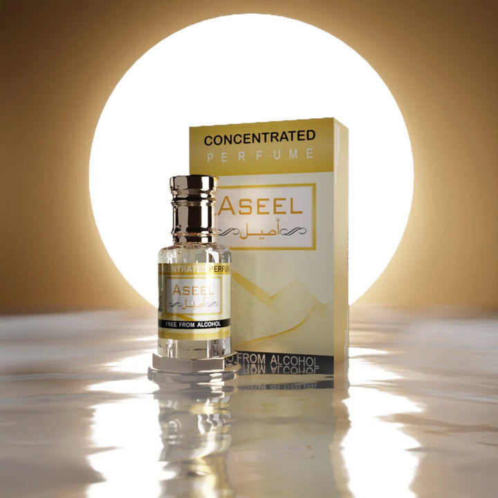 Aseel concentrated perfume with matching white and gold perfume box on reflective surface