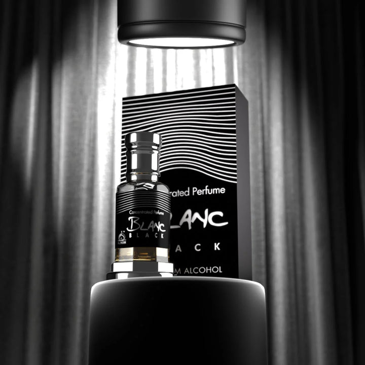 Blanc Black concentrated perfume with matching black perfume box in a dramatic monochrome setting