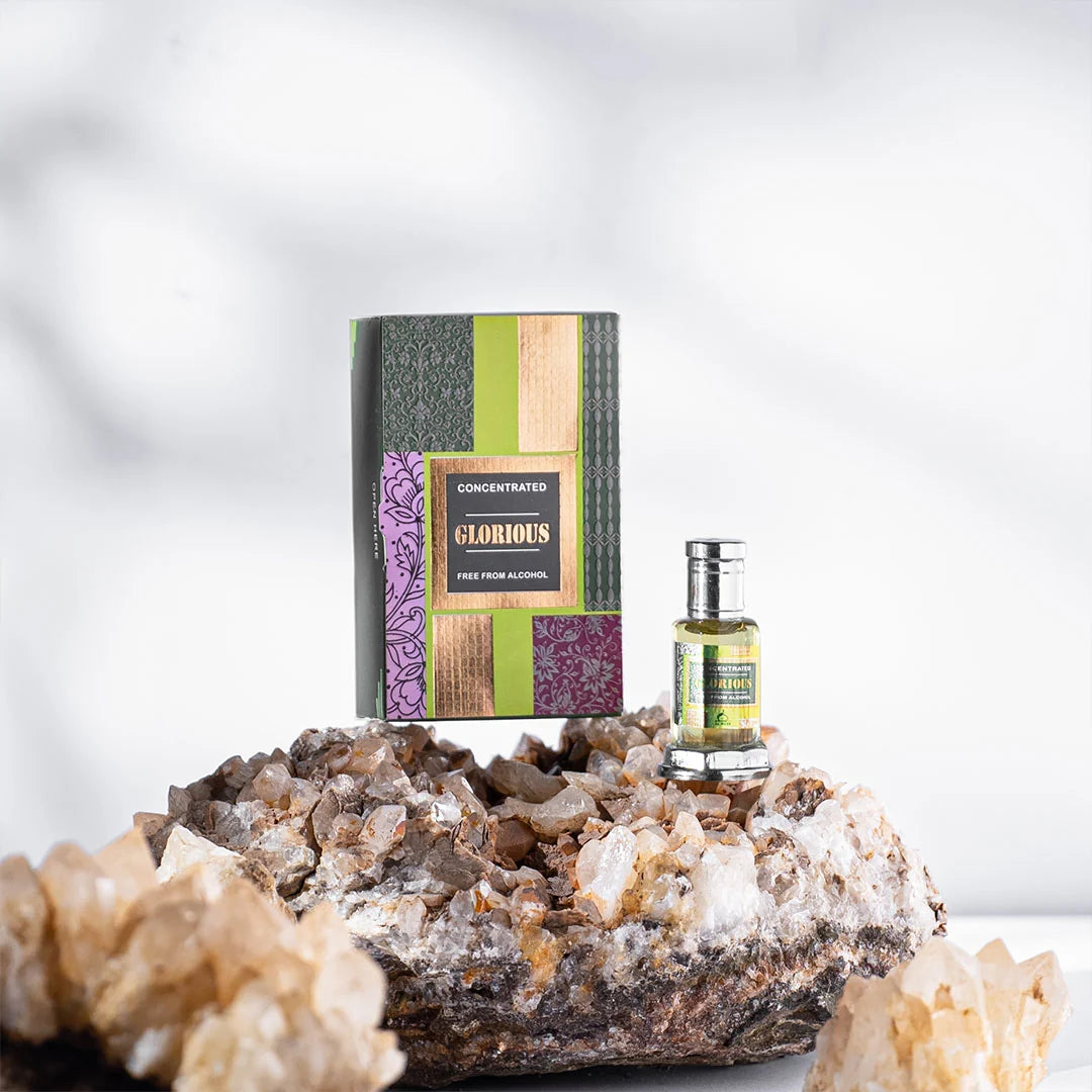 Glorious concentrated perfume bottle and box displayed on natural crystals and mineral rocks