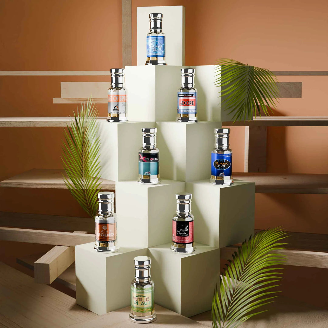Pack of 8 concentrated perfume attars displayed on white podiums