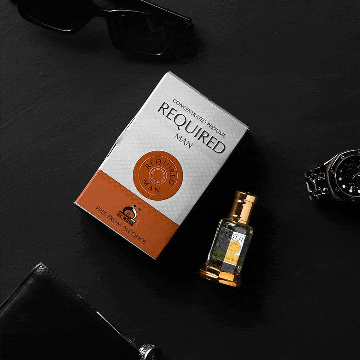 Required Man concentrated perfume bottle and box on a black luxury surface